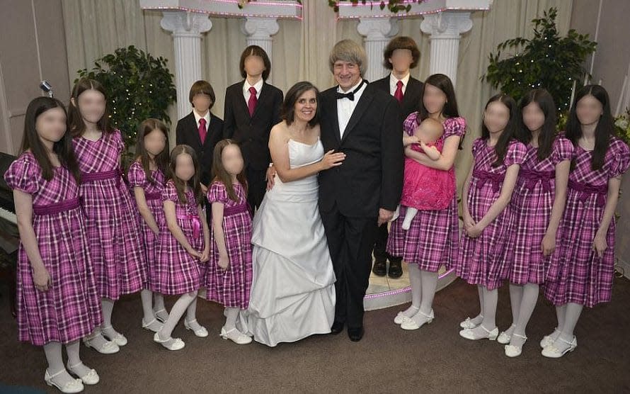 David and Louise Turpin joined by their children - wearing matching outfits - as they renewed their wedding vows in 2015 - Facebook