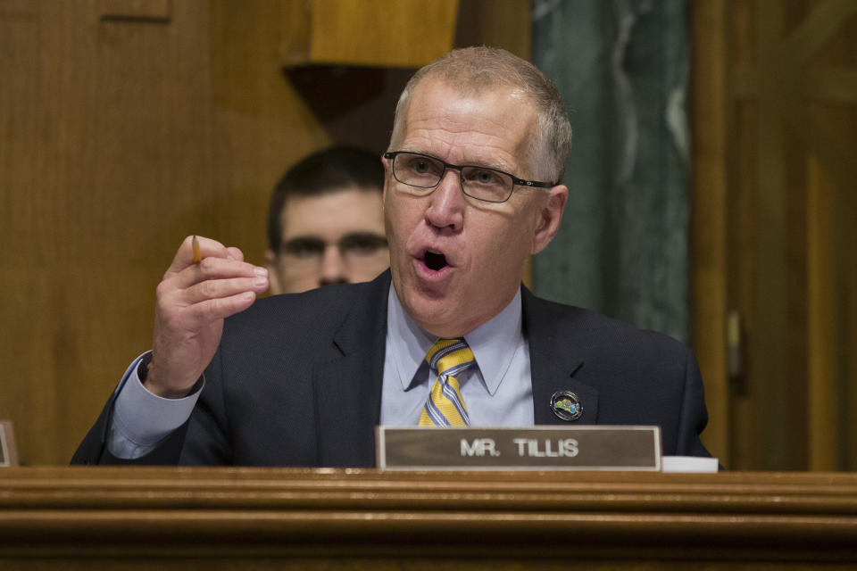 In this March 6, 2019, photo, Sen. Thom Tillis, R-N.C., questions U.S. Customs and Border Protection Commissioner Kevin McAleenan during a hearing of the Senate Judiciary Committee on oversight of Customs and Border Protection's response to the smuggling of persons at the southern border in Washington. Republicans from the White House to Congress to North Carolina are watching whether Tillis stands with Trump. (AP Photo/Alex Brandon)