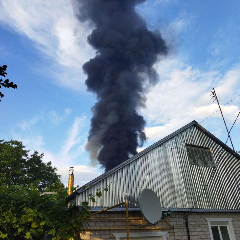 Clouds of smoke after a fuel storage depot was hit in an attack in Dnipro, Ukraine - Reuters