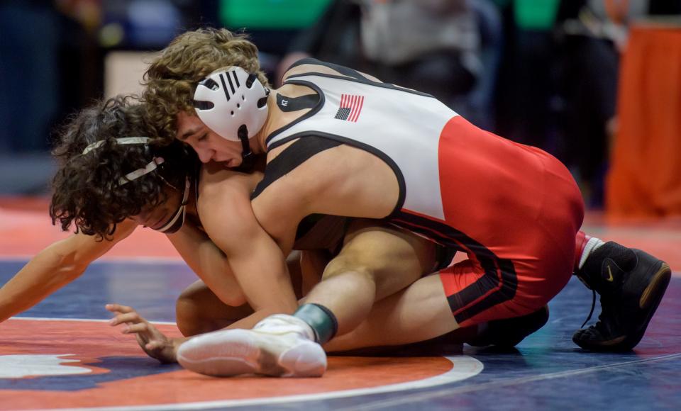 Chatham Glenwood's Drew Davis wrestles Grayslake Central's Anthony Alanis in the Class 2A 106-pound state title match Saturday, Feb. 19, 2022 at the State Farm Center in Champaign.