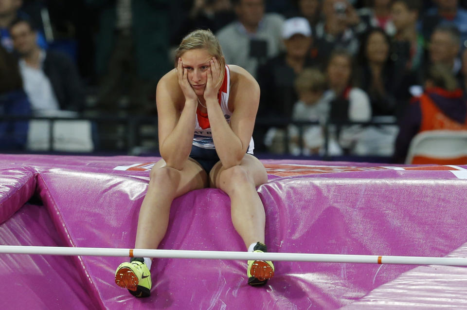 Britain's Holly Bleasdale reacts after failing to clear the bar during the women's pole vault final at the London 2012 Olympic Games at the Olympic Stadium August 6, 2012. REUTERS/Phil Noble (BRITAIN - Tags: SPORT ATHLETICS OLYMPICS) 