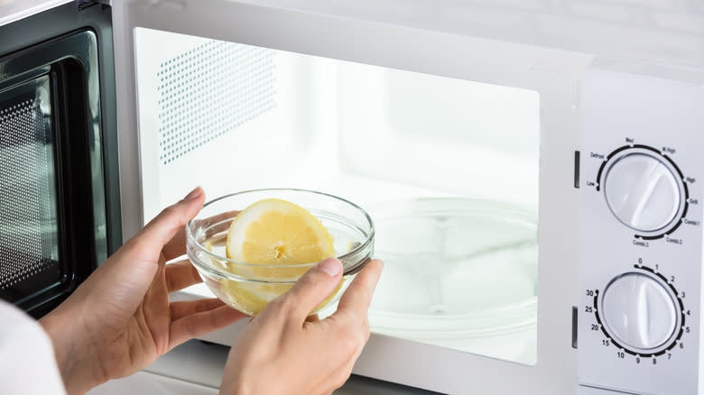 putting bowl of lemon in microwave