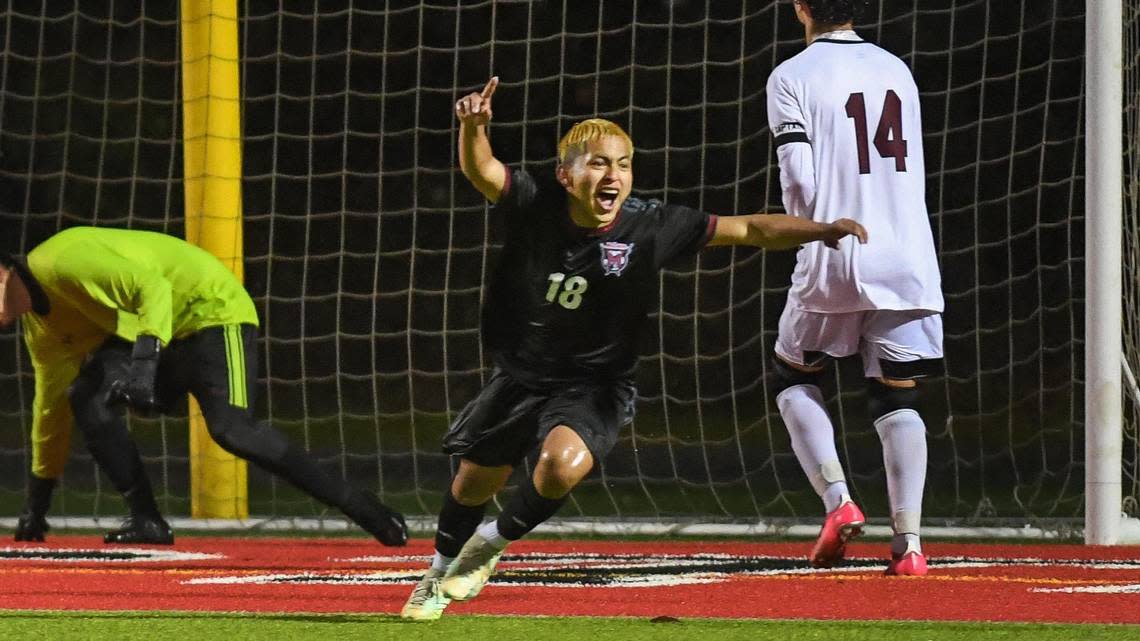 McLane’s Mayor Beb Caal celebrates the game-winning goal against Chavez in overtime of their Central Section Division III boys soccer championship game at McLane Stadium on Friday, Feb. 24, 2023.