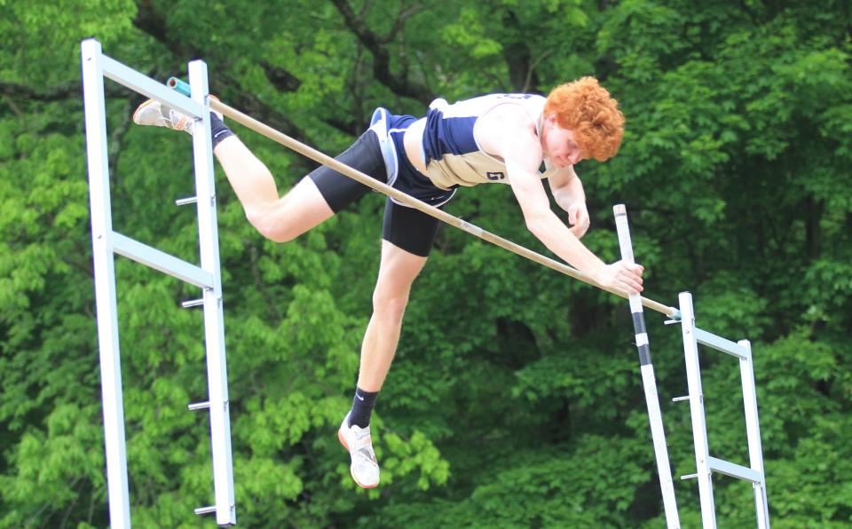 Lancaster's Daniel Edwards clears the bar at 15-feet-9 in the pole vault to win a jump-off with teammate Lukas Lang during the Ohio Capital Conference-Buckeye Division championships on Saturday, May 13, 2023. Edwards, Lang and teammate Brody Ehorn swept the top three spots in the event for the host Golden Gales, who won the team title.