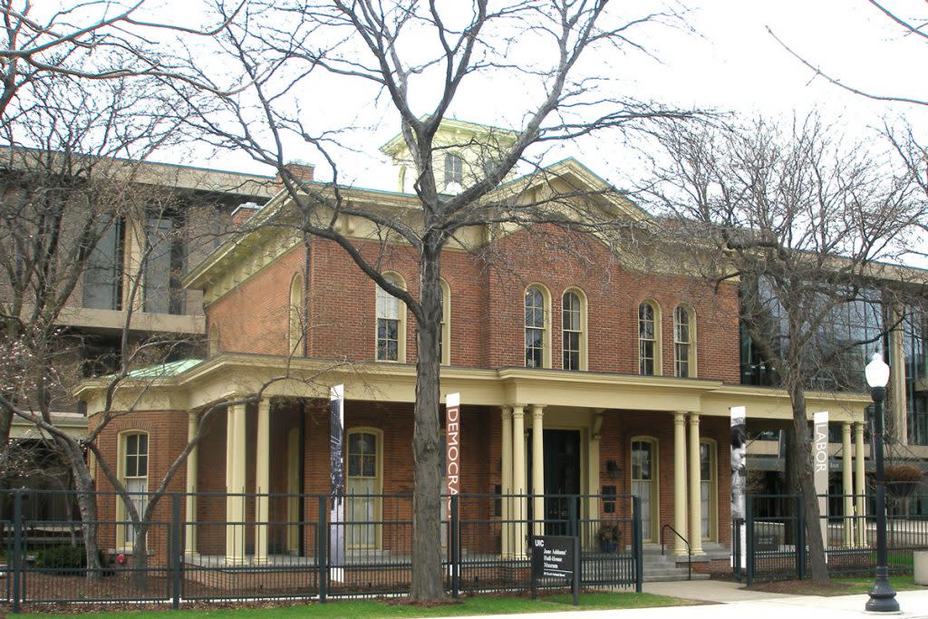 This is an exterior photo of ane Addams Hull-House Museum. The house is brick. 