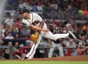 Aug 10, 2018; Atlanta, GA, USA; Atlanta Braves starting pitcher Kevin Gausman (45) delivers a pitch to a Milwaukee Brewers batter in the sixth inning at SunTrust Park. Mandatory Credit: Jason Getz-USA TODAY Sports