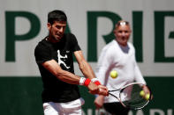 Tennis - French Open - Roland Garros - Paris - 25/05/2017. Novak Djokovic of Serbia and his coach Andre Agassi during a training session. REUTERS/Benoit Tessier