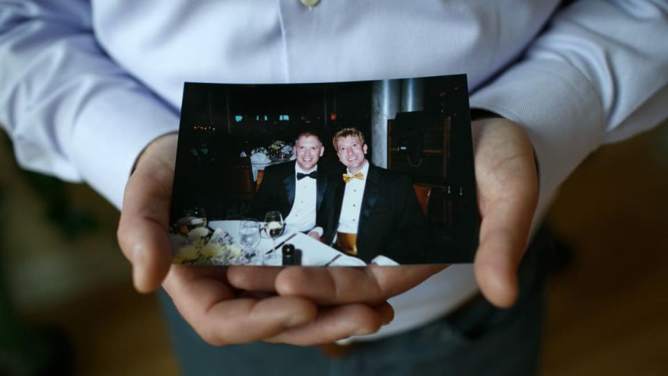 <div class="inline-image__caption"><p>Jim Obergefell holds a photo of himself and his late husband, John Arthur, in his condo in Cincinnati, Ohio, on April 2, 2015.</p></div> <div class="inline-image__credit">Maddie McGarvey/For The Washington Post via Getty</div>