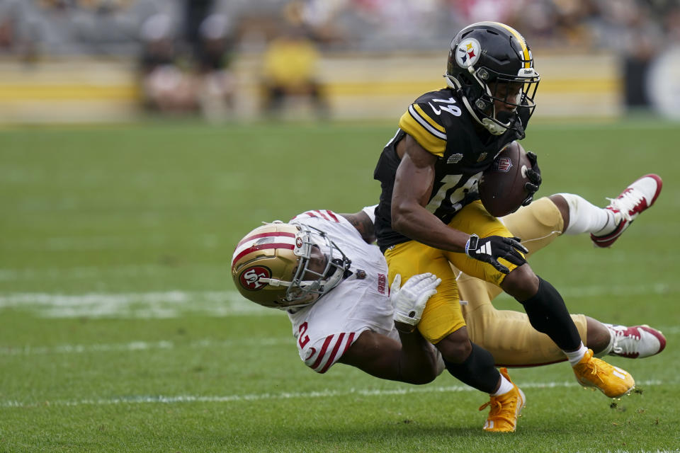 Pittsburgh Steelers wide receiver Calvin Austin III (19) is tackled by San Francisco 49ers cornerback Deommodore Lenoir during the second half of an NFL football game, Sunday, Sept. 10, 2023, in Pittsburgh. (AP Photo/Matt Freed)