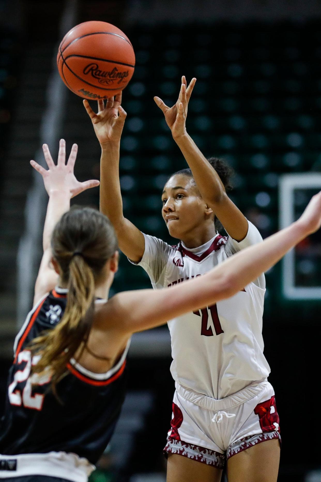 Detroit Renaissance guard Christian Sanders makes a jump shot against Rockford during the first half of Rockford's 65-42 win in the Division 1 girls basketball semifinal at Breslin Center on Friday, March 17, 2023.