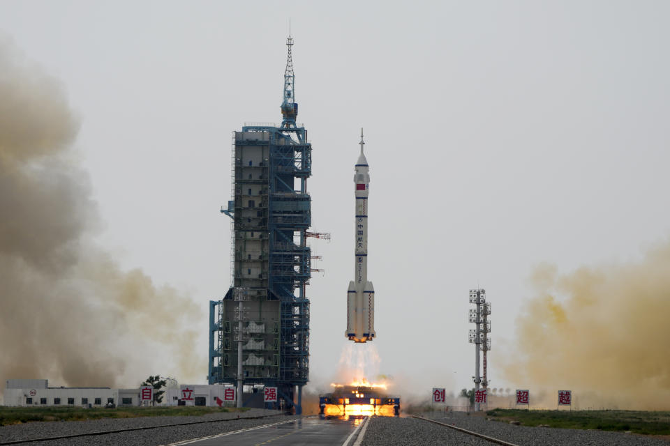 A Long March rocket carrying a crew of Chinese astronauts in a Shenzhou-16 spaceship lifts off at the Jiuquan Satellite Launch Center in northwestern China, Tuesday, May 30, 2023. (AP Photo/Mark Schiefelbein)