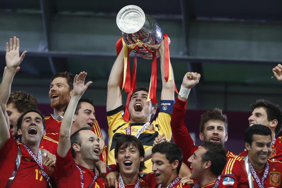 -	Euro 2012: World champion Spain defended their European title in style and fashion, thrashing Italy 4-0 in the final.