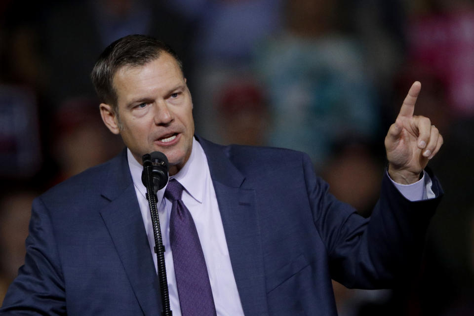 In this Oct. 6, 2018 file photo, Republican Kansas gubernatorial candidate Kris Kobach addresses the crowd during a campaign rally held by President Donald Trump in Topeka, Kan. The former Kansas Secretary of State is planning to give a speech after months of considering a run for the U.S. Senate next year. Kobach confirmed in January that he was considering running for the Republican nomination for four-term GOP Sen. Pat Roberts' seat. Roberts is not seeking re-election in 2020. Kobach lost the governor's race last year to Democrat Laura Kelly. (AP Photo/Charlie Riedel)