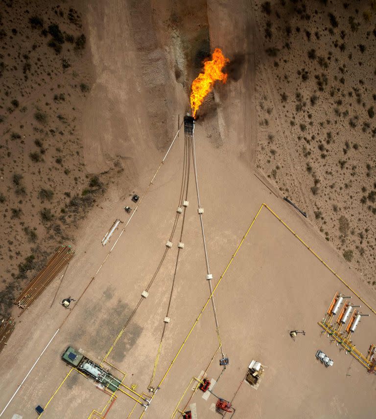 Aerial view of a gas deposit near Fortin de Piedra in Anelo, Neuquen province, Argentina, in the Vaca Muerta Formation, on November 27, 2019. - Vaca Muerta is an enormous non-conventional oil and gas deposit nestled in a geologic formation. It occupies over 30,000 square kilometers in the states of Neuquen, Rio Negro, La Pampa and Mendoza and provides 43% of the total oil production and 60% of the gas production of Argentina. (Photo by Emiliano Lasalvia / AFP