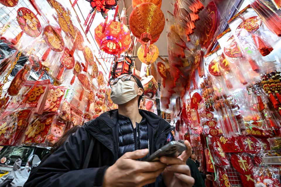 January 29, 2024: People shop for Lunar New Year decorations in Hong Kong for the upcoming Year of the Dragon.