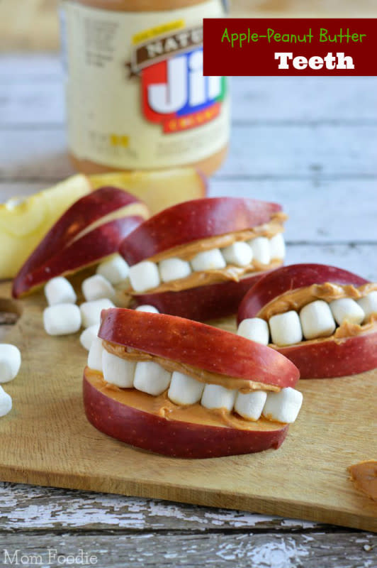 <p>A fun and fruity snack the kids will adore as equally as they love their Halloween candy. </p><p><strong>Get the recipe: </strong><a href="https://momfoodie.com/apple-peanut-butter-teeth-fun-easy-kids-snack/" rel="nofollow noopener" target="_blank" data-ylk="slk:Apple Peanut Butter Teeth;elm:context_link;itc:0;sec:content-canvas" class="link ">Apple Peanut Butter Teeth</a></p>