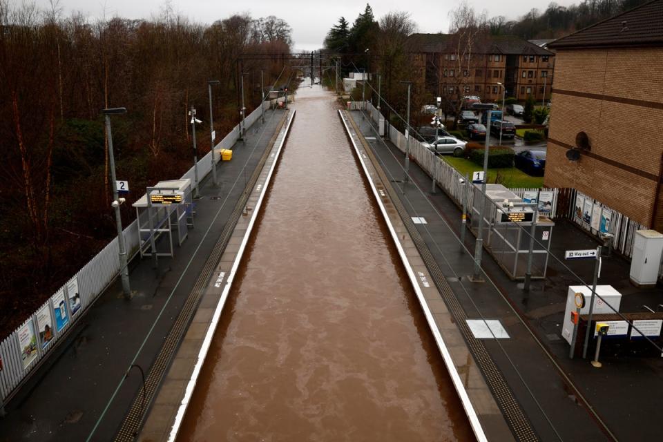 The tracks at Bowling train station were completely submerged by floodwaters (Getty)