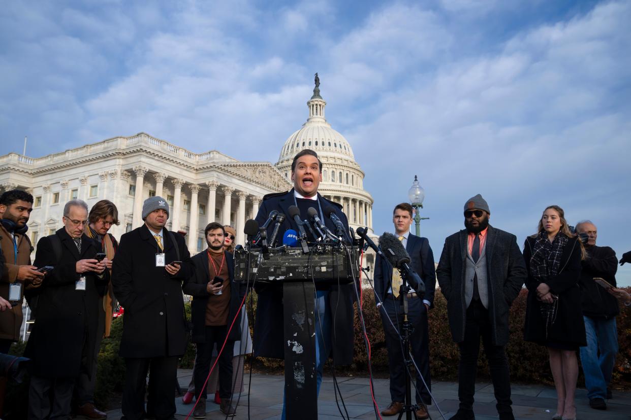 Rep. George Santos, R-N.Y., faces reporters at the Capitol in Washington, early Thursday, Nov. 30, 2023 (AP)