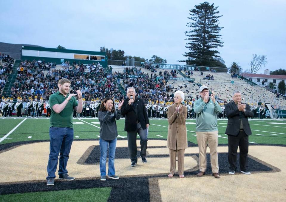 Cal Poly President Jeffrey Armstrong announces plans for the new John Madden Football Center, at halftime of the Mustangs’ game against Sacramento State on Oct. 1, 2022. Virginia Madden, John Madden’s wife and a Cal Poly alumna, and her sons, Mike and Joe, and grandson, Jack, a Cal Poly nutrition major, attended the game to participate in the announcement.