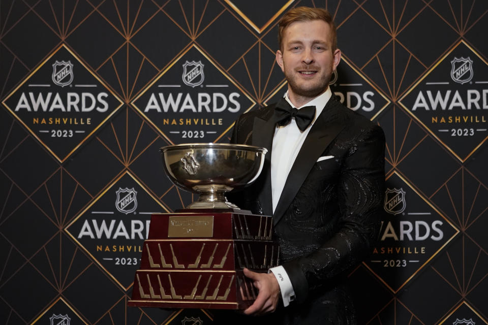 Boston Bruins hockey player Linus Ullmark poses after winning the William M. Jennings Trophy at the NHL Awards, Monday, June 26, 2023, in Nashville, Tenn. (AP Photo/George Walker IV)