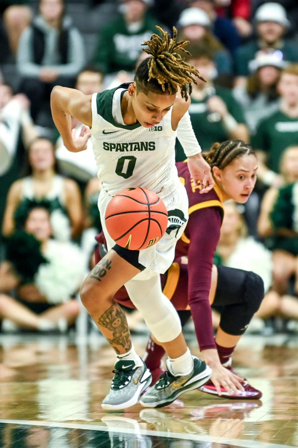 Michigan State's DeeDee Hagemann gets away from Minnesota's Amaya Battle during the second quarter on Monday, Feb. 5, 2024, at the Breslin Center in East Lansing.