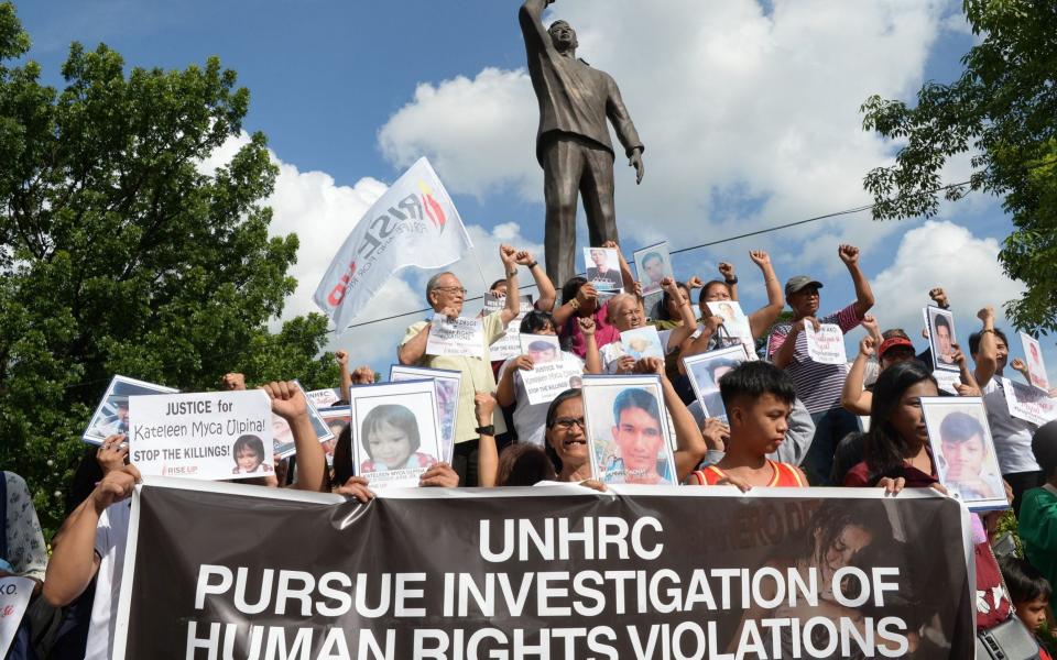 Relatives of those who have died in the extrajudicial killings have long called for an international investigation - TED ALJIBE /AFP