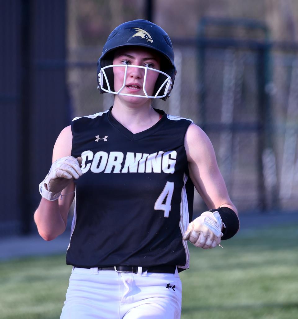 Corning's Lauren DeRosa crosses the plate in an 18-2 win over Elmira in a STAC softball game April 29, 2024 at Elmira High School.