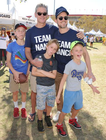 <p>Gregg DeGuire/WireImage</p> Simon Halls and Matt Bomer with their 3 kids.