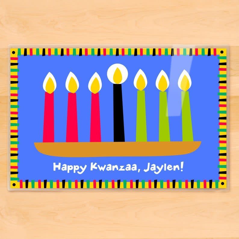 <p><strong>ArtAppeel</strong></p><p>etsy.com</p><p><strong>$17.00</strong></p><p>Both kids and adults will love this personalized Kwanzaa laminated placemat, which measures 12 inches by 18 inches and is made with heavy cardstock paper. </p>