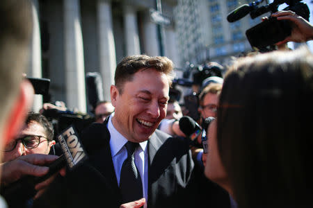 Tesla Inc. CEO Elon Musk exits after attending for an S.E.C. hearing at the Manhattan Federal Courthouse in New York, April 4, 2019. REUTERS/Eduardo Munoz