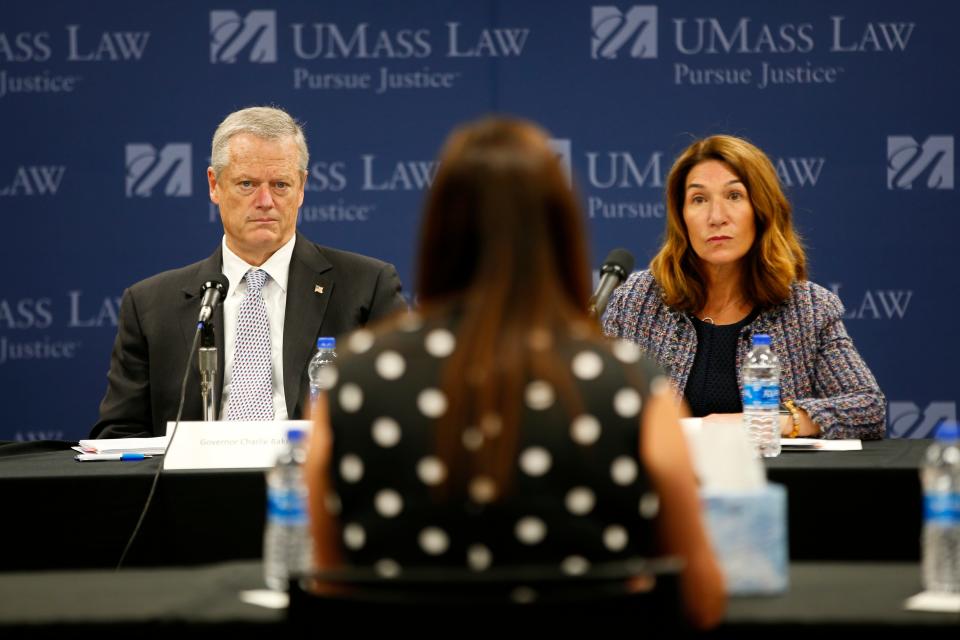 Massachusetts Governor Charlie Baker and Lt Governor Karyn Polito listen to the testimony of a victim of domestic violence, during a Dangerousness Roundtable discussion with Bristol County DA Thomas M. Quinn III held at UMass Law in Dartmouth.
