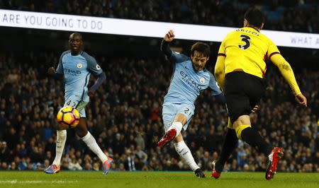 Britain Football Soccer - Manchester City v Watford - Premier League - Etihad Stadium - 14/12/16 Manchester City's David Silva scores their second goal Action Images via Reuters / Jason Cairnduff Livepic