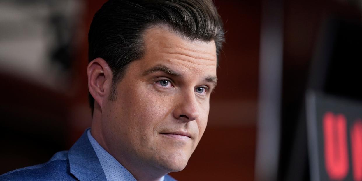 Rep. Matt Gaetz, R-Fla., listens during a news conference at the Capitol in Washington, Tuesday, Dec. 7, 2021.