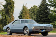 <p>It’s big, huge even, and thus has presence, but size isn’t the Toronado’s only arresting feature. Exquisite proportions, pillarless elegance and spare detailing are as much a triumph as its front-drive powerpack.</p>