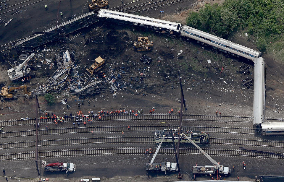 Investigators work near the wreckage of an Amtrak Northeast Regional train from New York to Washington, D.C., that <a href="http://www.huffingtonpost.com/2015/05/12/amtrak-train-crash-pennsylvania_n_7270804.html">derailed in Philadelphia</a> on May 13. At least <a href="http://www.huffingtonpost.com/2015/05/13/amtrak-train-crash_n_7274392.html">seven people were killed</a> and 200 injured.