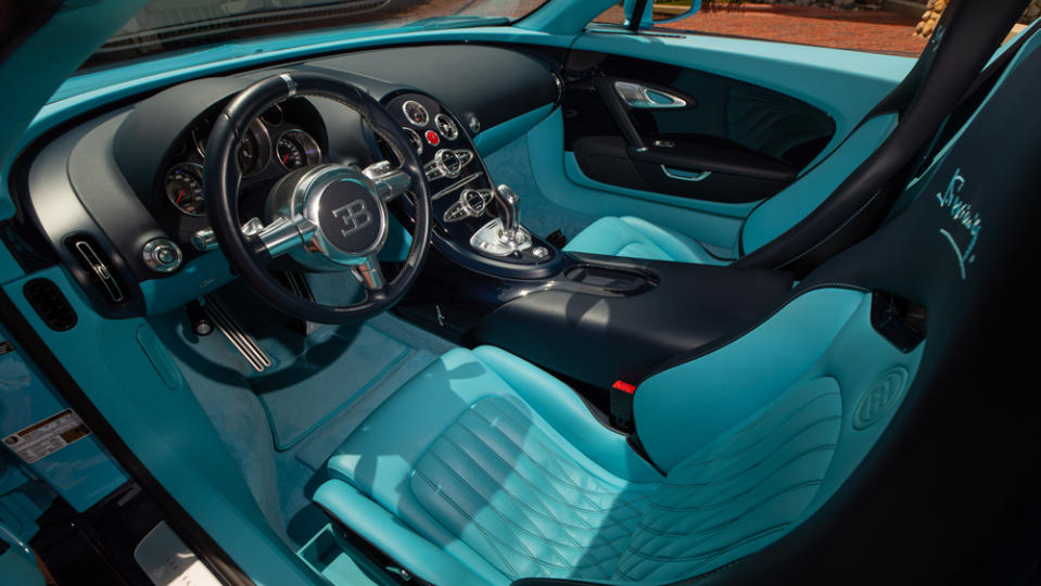 The cockpit is dressed in rich leather presented in a French Blue and contrasting Lake Blue color scheme. - Credit: Mecum Auctions