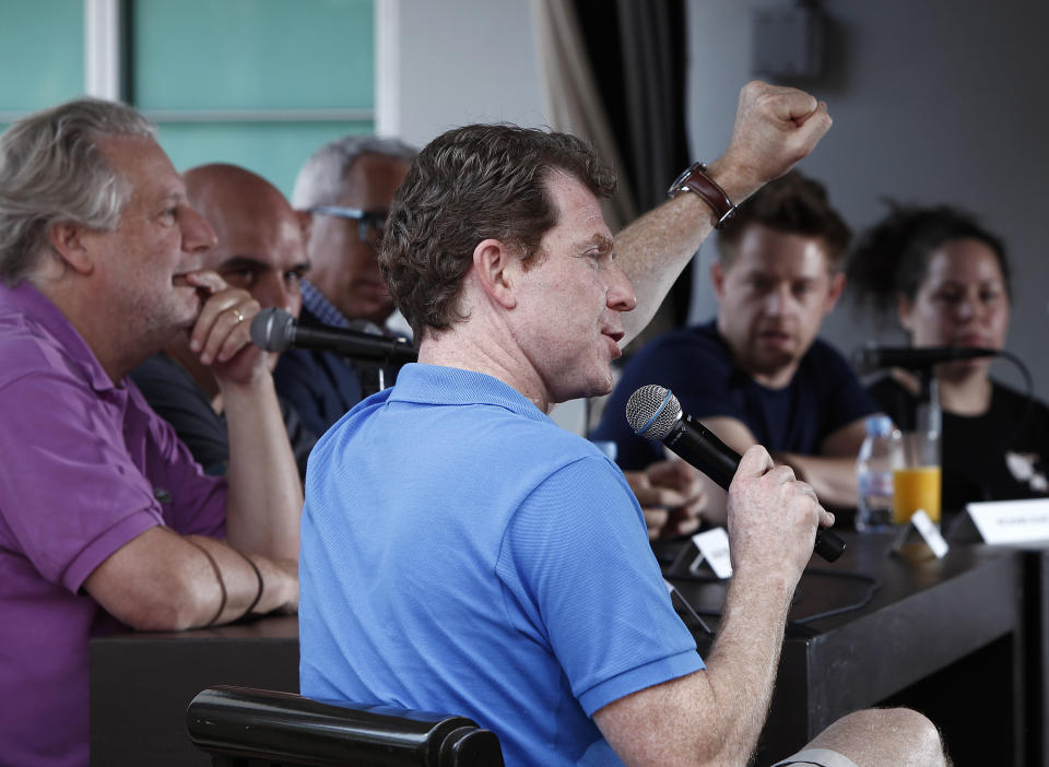 Celebrity chef Bobby Flay moderates a panel discussion about about the experience of competing on TV cooking competitions, Saturday, Feb. 25, 2012 in Miami. (AP Photo/Carlo Allegri)