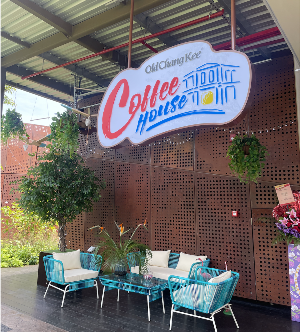 Old Chang Kee's Coffee House comes with blue tables and chairs