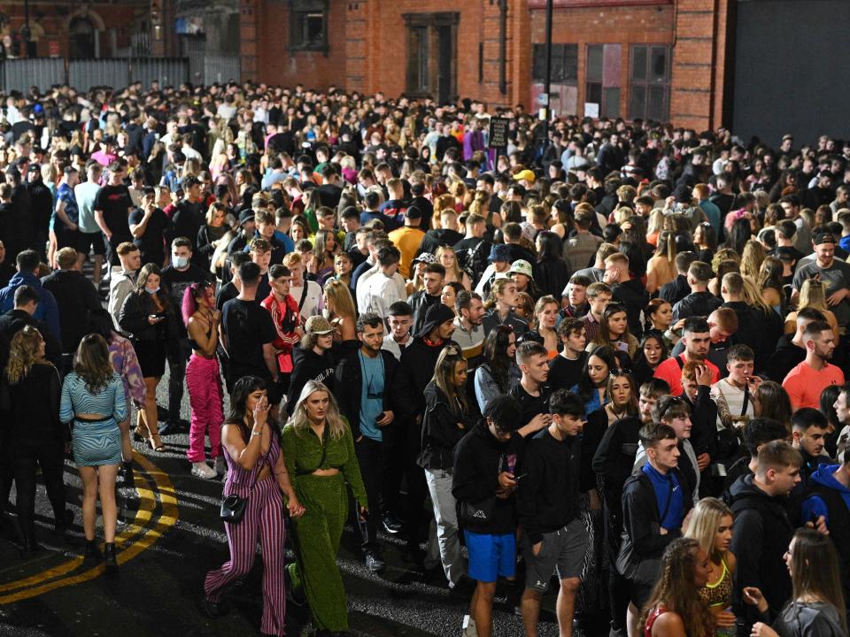 The queue to enter Depot Mayfield, a 10,000 capacity club in Manchester (AFP via Getty Images)