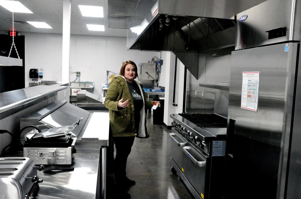 Delight Howells in the kitchen of the LincWay Cafe & Market. The eatery doubles as a food court for the STEAM Playlab.