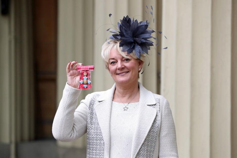 Entrepreneur Jo Malone poses after being made a CBE at an investiture ceremony at Buckingham Palace on November 16, 2018 (Getty Images)