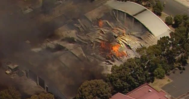 Around 11 fire trucks are battling a factory blaze at Newtown near Geelong. Photo: 7News