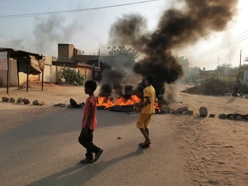 Protesters block a road in Khartoum