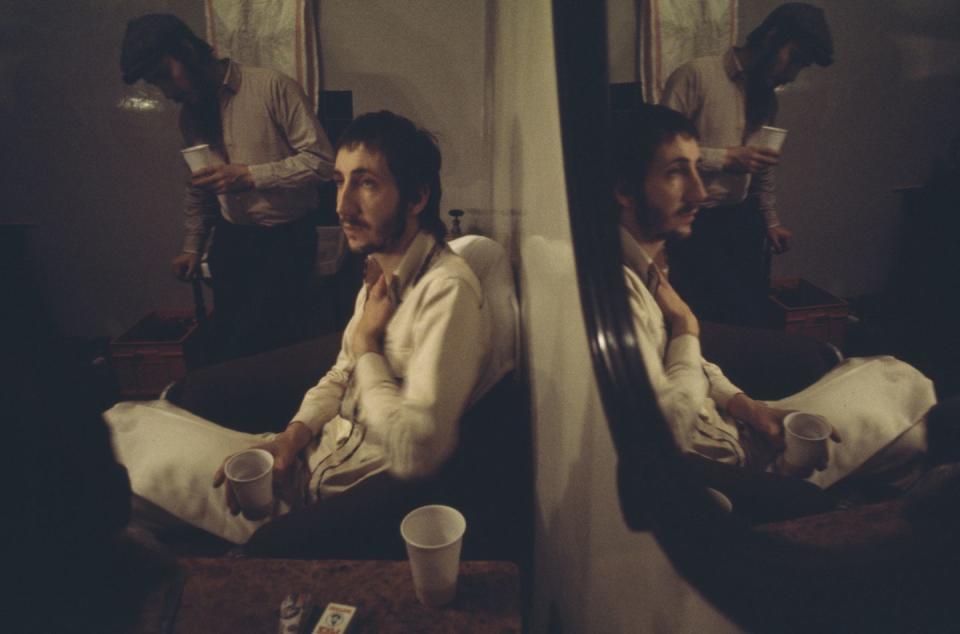 <p>Pete Townshend sitting backstage, circa 1970.</p>