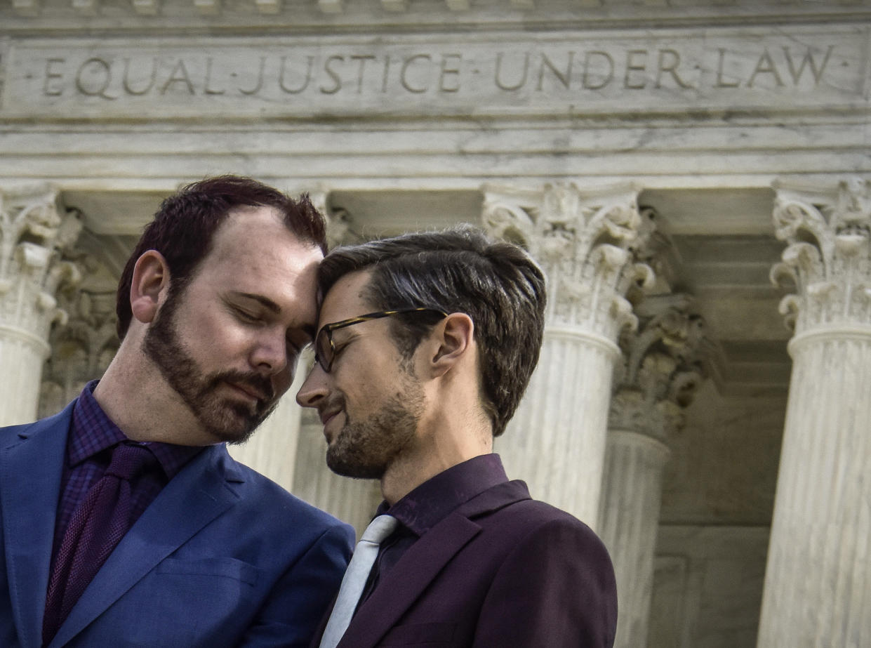 Plaintiffs Charlie Craig and David Mullins stand in front of the Supreme Court after the justices heard arguments in Masterpiece Cakeshop v. Colorado Civil Rights Commission on Dec. 5, 2017. (The Washington Post via Getty Images)