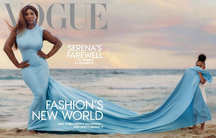 Serena poses on the beach with her hands on her hips as her daughter Olympia holds up the train of her mother's gown