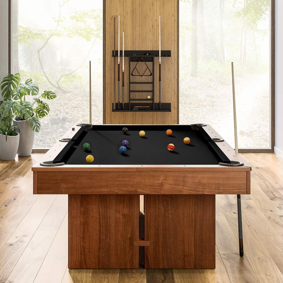 <p><a href="https://go.redirectingat.com?id=74968X1596630&url=https%3A%2F%2Fwww.crateandbarrel.com%2Fblack-and-walnut-pool-table-with-wall-rack-and-accessories%2Fs269732&sref=https%3A%2F%2Fwww.housebeautiful.com%2Froom-decorating%2Fliving-family-rooms%2Fg45851977%2Fman-cave-ideas%2F" rel="nofollow noopener" target="_blank" data-ylk="slk:Shop Now;elm:context_link;itc:0;sec:content-canvas" class="link ">Shop Now</a></p><p>Pool Table</p><p>crateandbarrel.com</p><p>$5999.00</p><span class="copyright">Crate & Barrel</span>