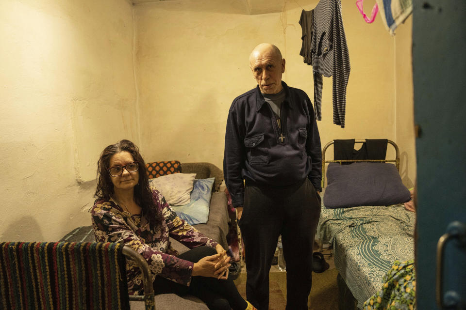 Natalia Zubkova and Serhii Zubkov sit in the shelter of a hospital in Krasnohorivka, Ukraine, Friday, Feb. 17, 2023. (AP Photo/Evgeniy Maloletka)