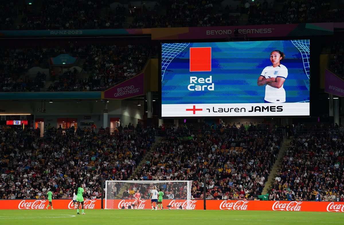 The big screen at the Brisbane Stadium shows a red card for Lauren James (PA)