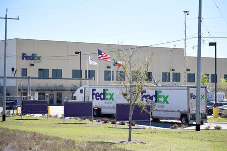 A FedEx truck is seen outside FedEx facility following the blast, in Schertz, Texas, U.S., March 20, 2018. REUTERS/Sergio Flores